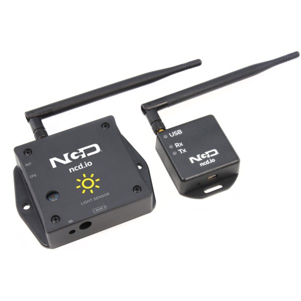 NCD PR49-24C - 센서 본체와 USB 무선 모뎀이 함께 놓인 모습